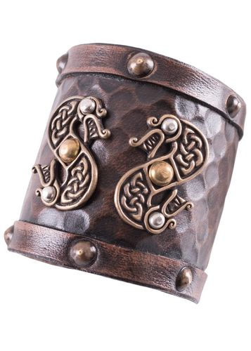 Kort armbeskytter præget med keltisk drage